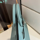  polished structured bag styled with outfit