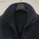 Close-up detail shot of Louis Vuitton luxury clothing with signature branding