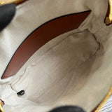 Side profile of modern elevated women's handbag – women's designer-style accessory