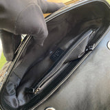 Close-up detail of polished elevated women's handbag – women's luxury accessory