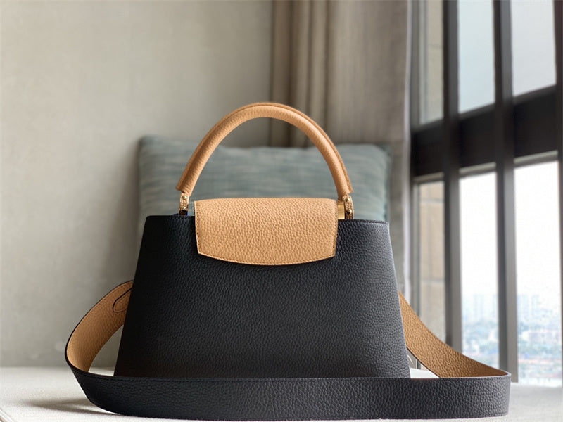  Sophisticated top-handle bag carried on shoulder