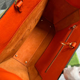 Side profile of refined structured women's handbag – women's statement bag