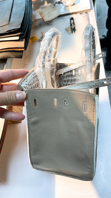 Side view of statement structured handbag