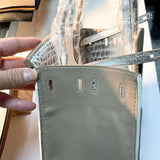 Side view of statement structured handbag