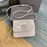 Modern Premium PU Leather Handbag - Polished Finish | Women's Luxury Handbag #651 - front view (image 1) of designer-inspired handbag