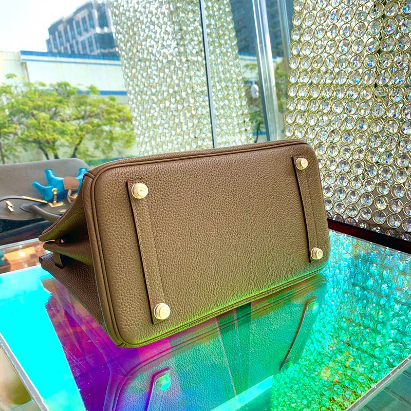 Side view of effortless structured handbag