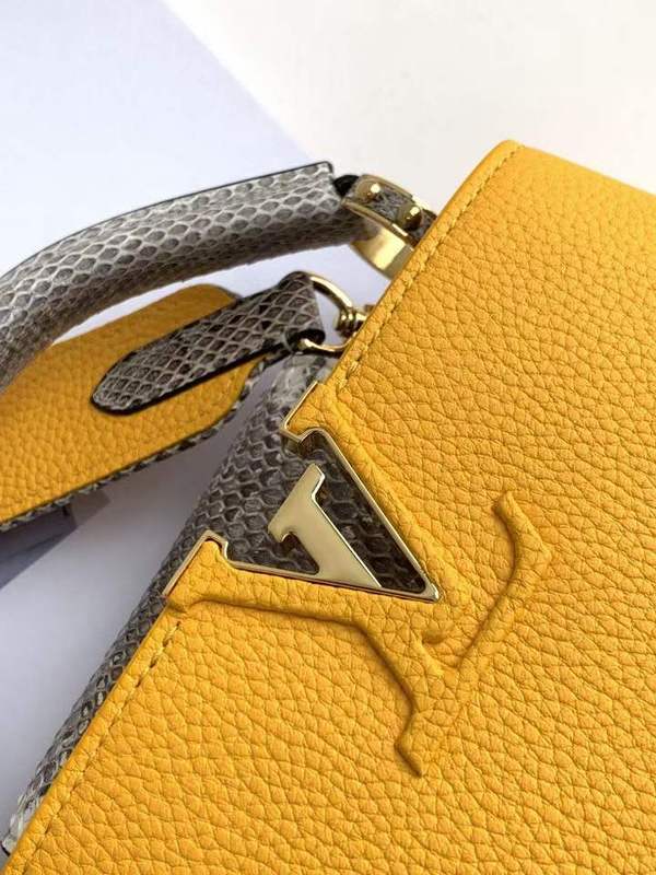 Back view of signature classic women's handbag – women's statement bag