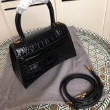 Top view of classic sleek women's handbag – women's luxury accessory