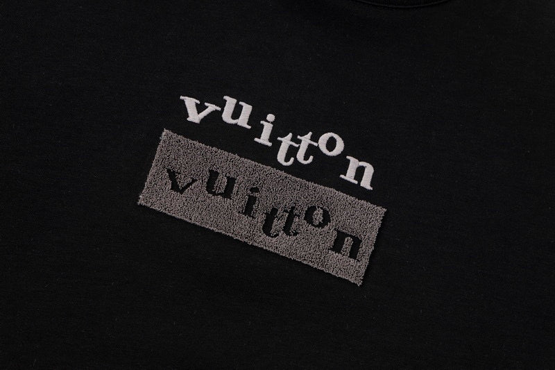 Flat lay presentation of Louis Vuitton cotton t-shirt with logo-detail design
