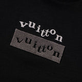 Flat lay presentation of Louis Vuitton cotton t-shirt with logo-detail design