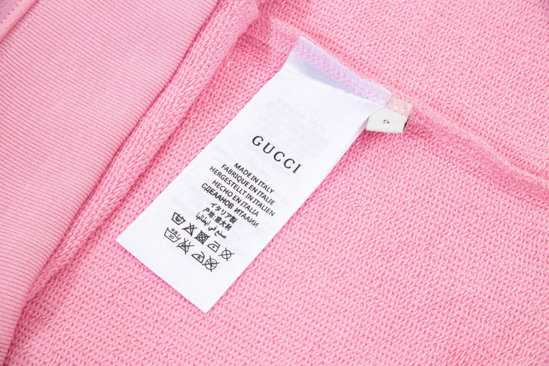 Close-up detail shot of Gucci luxury clothing with everyday silhouette