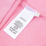 Close-up detail shot of Gucci luxury clothing with everyday silhouette