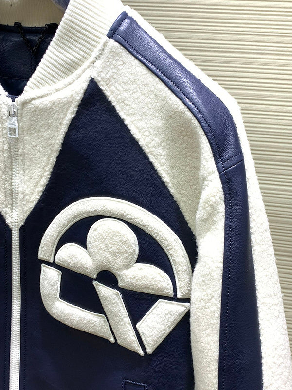 Close-up detail shot of Louis Vuitton luxury clothing with label-forward styling