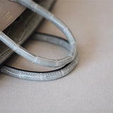  tailored handbag styled with outfit