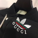 Back view of Gucci luxury clothing with monogram-inspired silhouette