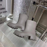 Balenciaga Burgundy Knee-High Boots - Close-Up Texture View