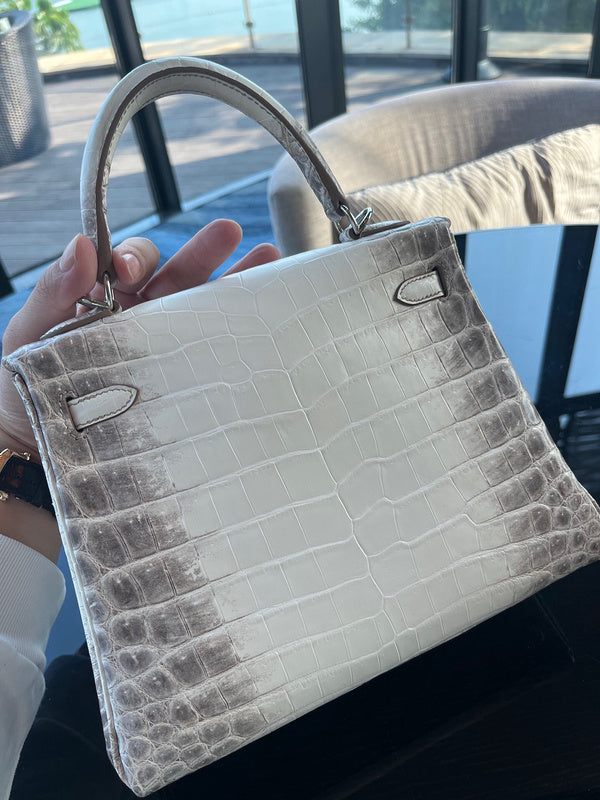 Side view of modern structured handbag