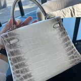 Side view of modern structured handbag