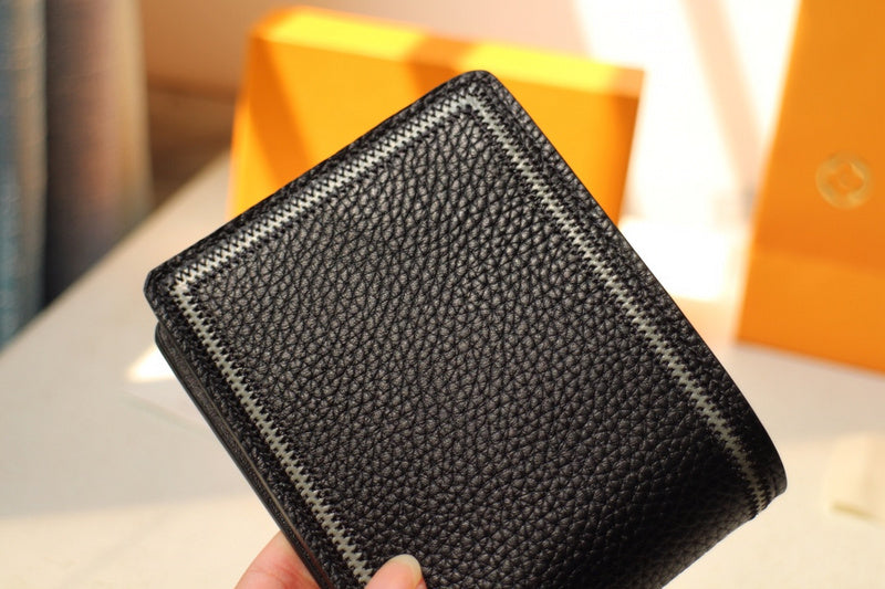 Side profile of signature sleek women's handbag – women's luxury accessory