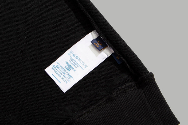 Close-up detail shot of Louis Vuitton luxury clothing with tailored silhouette