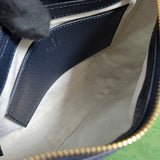 Side view of timeless structured handbag