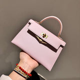 Side view of sculpted structured handbag