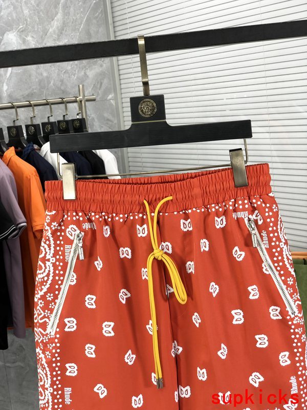 Close-up detail shot of Rhude luxury clothing with label-forward styling