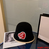 Close-up detail view of Louis Vuitton unisex cap