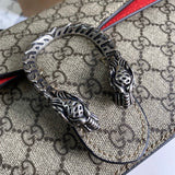 Handle and strap detail of statement structured women's handbag – women's designer-style accessory