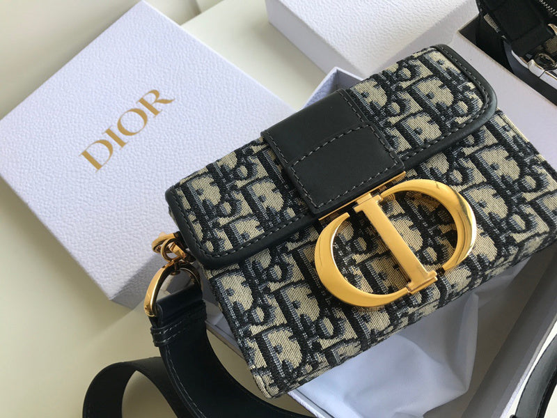 Close-up detail of polished signature women's handbag – women's designer-style accessory