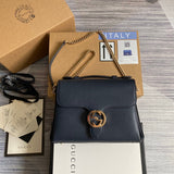 Front view of modern sleek women's handbag – women's designer-style accessory