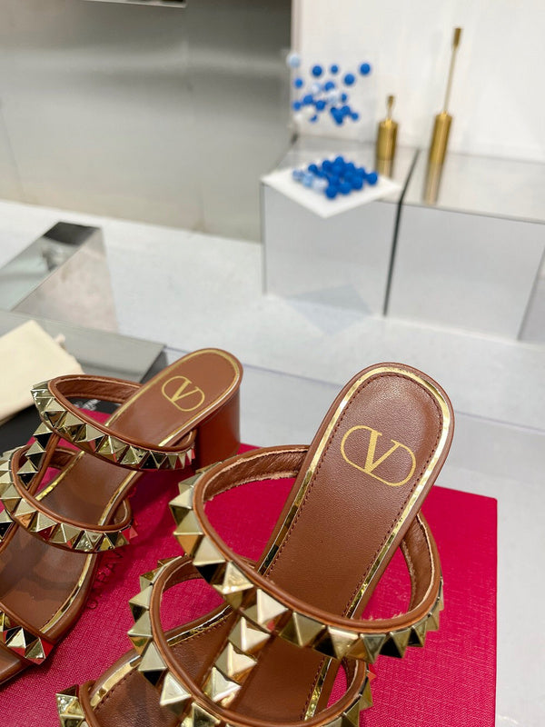 Three-quarter angle view of Valentino Garavani luxury piece style No.242