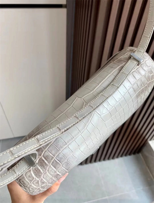 Side view of statement structured handbag