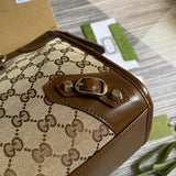 Styled lifestyle shot of polished refined women's handbag – women's luxury handbag