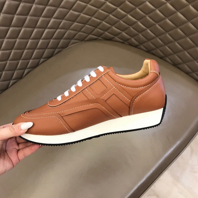 Hermès White High-Top Sneakers - Close-Up Texture View