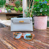 Side view of smart structured handbag