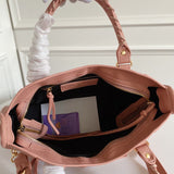 Zivas Charm Polished Finish Statement Handbag (Signature Shape & Finish) – Close-Up Detail