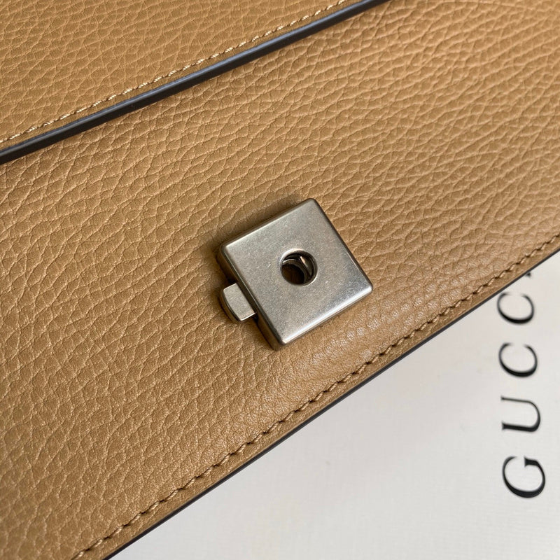 Close-up detail of structured sleek women's handbag – women's designer-style accessory