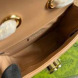 Handle and strap detail of classic polished women's handbag – women's designer-style accessory