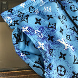 Close-up detail shot of Louis Vuitton cotton t-shirt with runway-inspired design