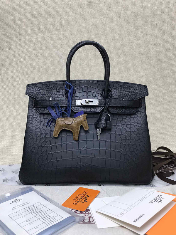 Side view of poised structured handbag