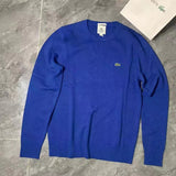 Close-up detail shot of Lacoste luxury clothing with logo-detail design