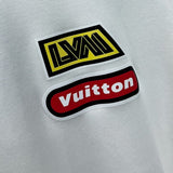 Flat lay presentation of Louis Vuitton luxury clothing with streetwear-inspired cut