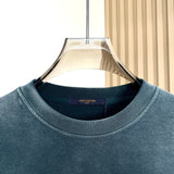 Flat lay presentation of Louis Vuitton luxury clothing with everyday silhouette