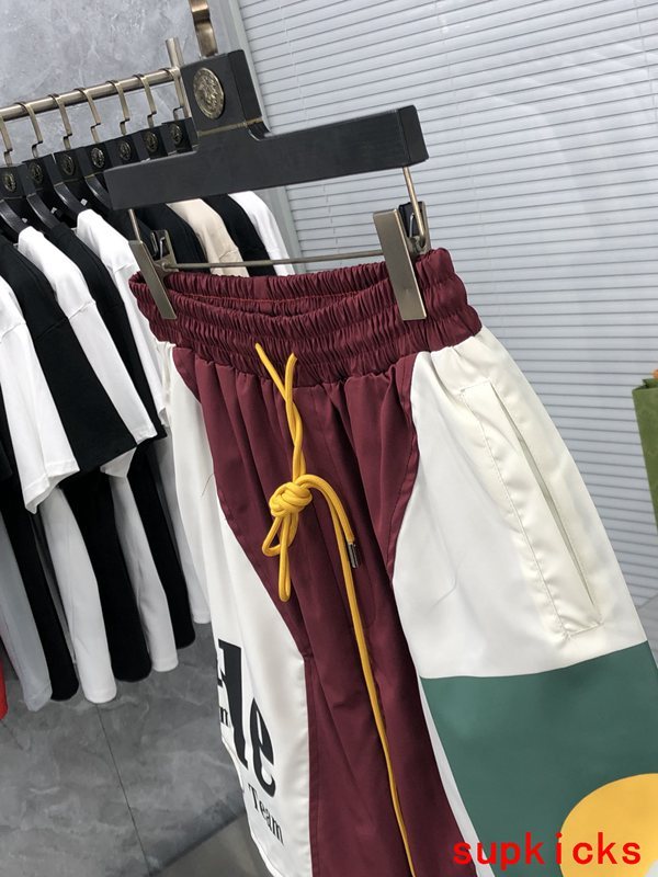 Flat lay presentation of Rhude luxury clothing with streetwear-inspired cut