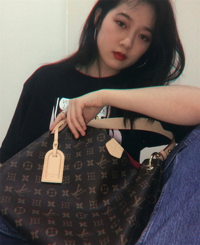  tailored crossbody bag detail view showing craftsmanship 14