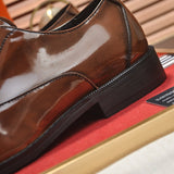 Hermes shoes Style 055 - close-up of classic monogram styling