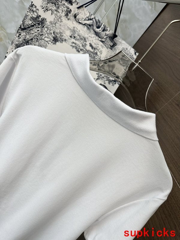 Close-up detail shot of Moncler luxury clothing with signature branding