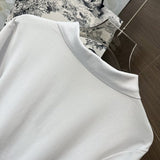 Close-up detail shot of Moncler luxury clothing with signature branding