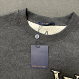 Full styled look of Louis Vuitton luxury clothing with logo-detail design